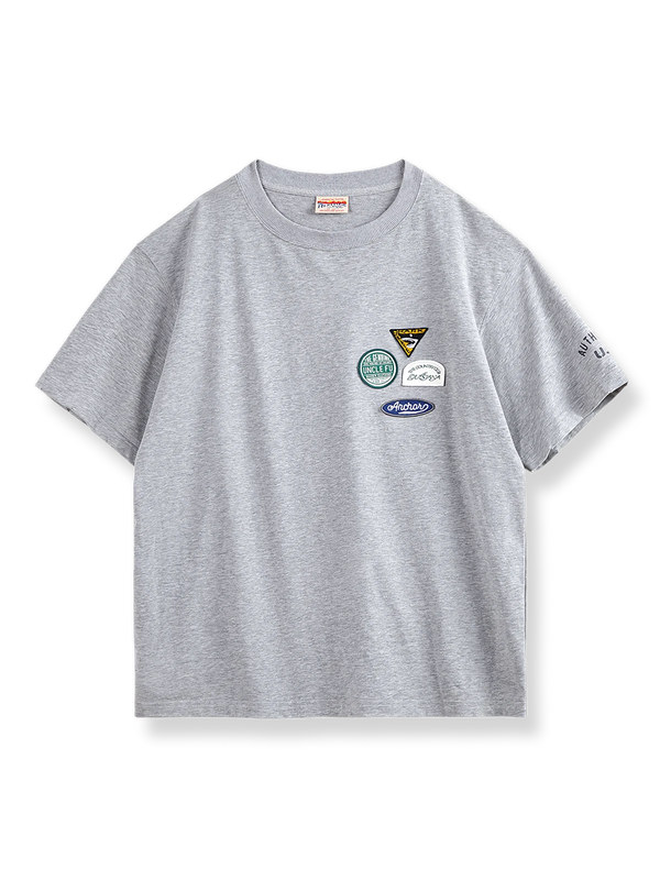 T-shirt with embroidered badge