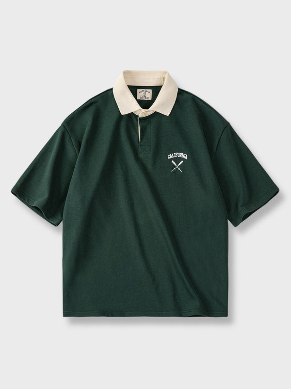 Dark green embroidered polo shirt