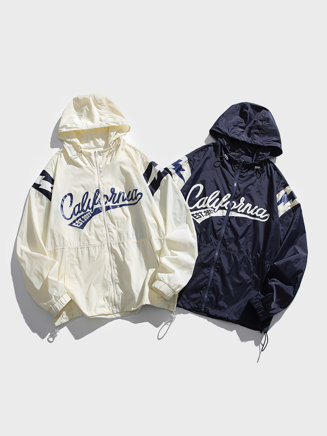 カリフォルニアスタイルのUVカットジャケット、フード付き、リラックスフィットデザイン、フロントに「California」の文字が特徴。