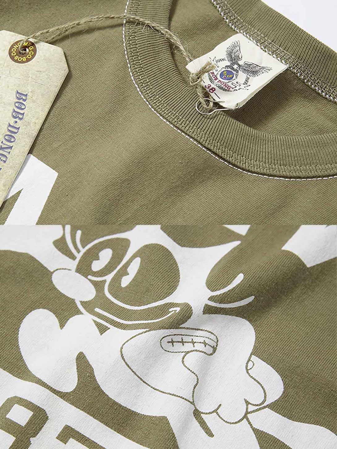 Tシャツのフィリックス・ザ・キャット（Felix the Cat）プリントとNAVY 87A FOOTBALLの文字の特写画像