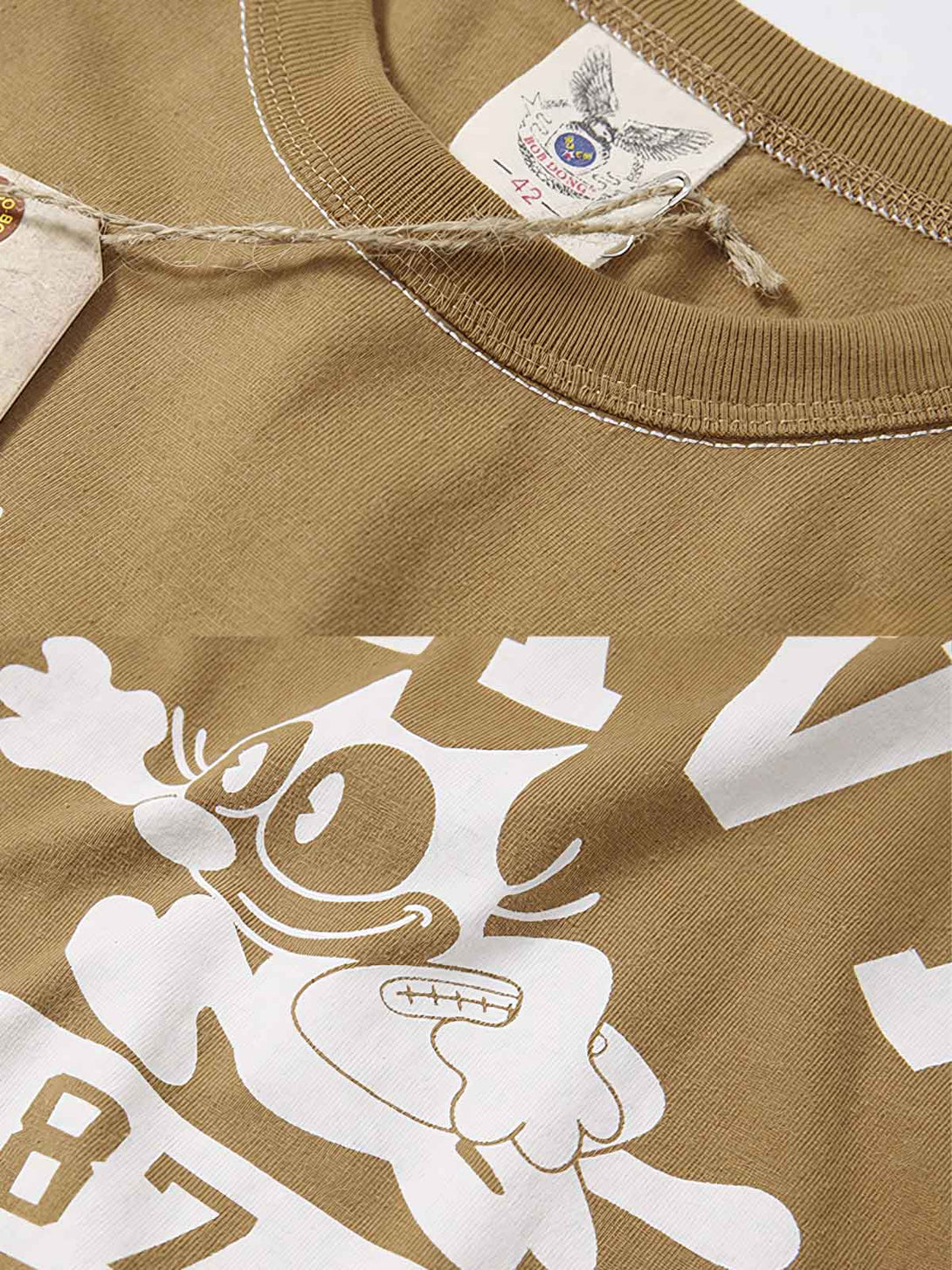 Tシャツのフィリックス・ザ・キャット（Felix the Cat）プリントとNAVY 87A FOOTBALLの文字の特写画像